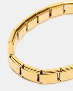 BRACELET ÉLASTIQUE À MAILLONS DORÉ