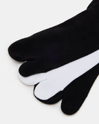 CHAUSSETTES MONTANTES À ORTEILS SÉPARÉS NOIR/BLANC